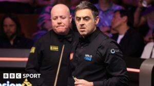 Read more about the article John Higgins recovers to beat Ronnie O’Sullivan in Crucible epic in World Championship last 16